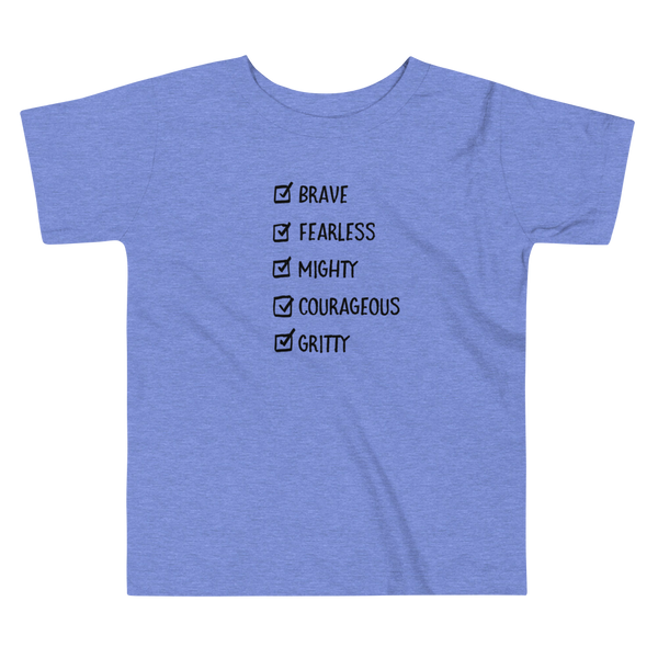 A checklist of text all checked off with the words brave, fearless, mighty, courageous, gritty on a heather columbia blue kids t-shirt