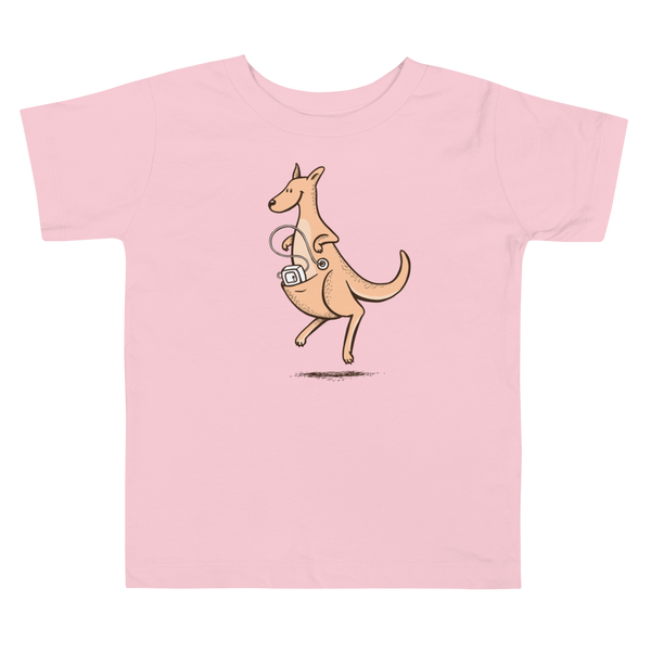 A happy orange kangaroo hops along with her Joey feeding pump and feeding tube sitting in her pouch with a g-tube in the stoma on a pink kids t-shirt.