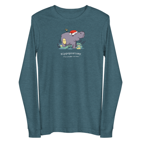 A Hippo or Hippopotamus with an ostomy bag — also known as a Hippopostomy. He is standing in some foliage smiling and has a bird on his back with a Christmas hat on a heather deep teal adult long sleeve t-shirt.