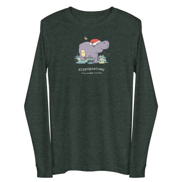 A Hippo or Hippopotamus with an ostomy bag — also known as a Hippopostomy. He is standing in some foliage smiling and has a bird on his back with a Christmas hat on a heather forest adult long sleeve t-shirt.